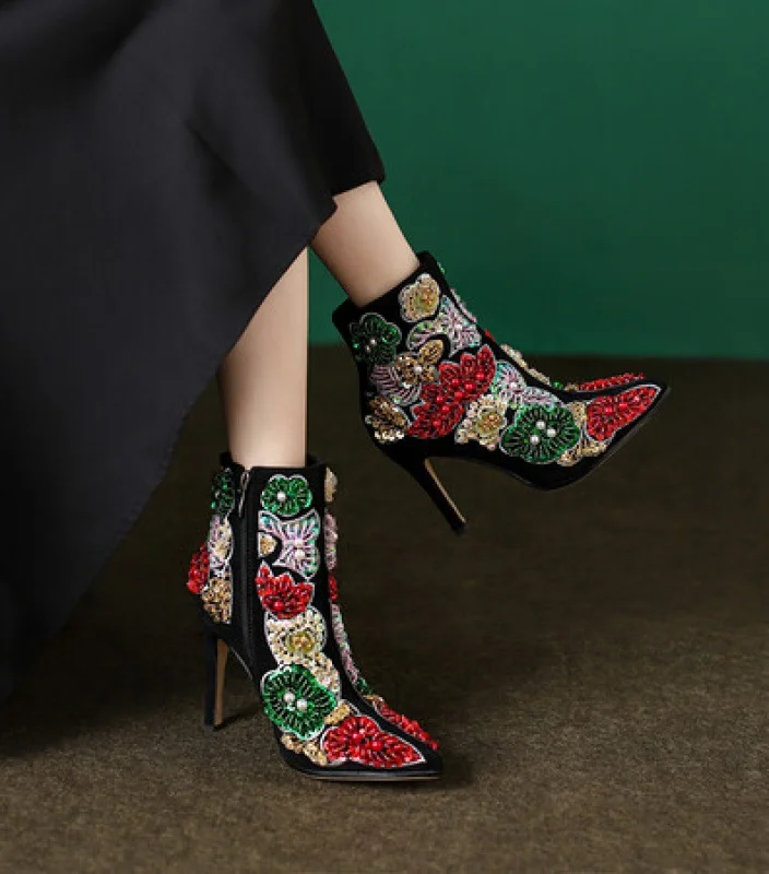 Step into timeless charm with the Retro Blossom Ankle Leather Boots. The intricate blossom design adds a touch of vintage allure to these leather boots, making every stride a statement of elegance and style