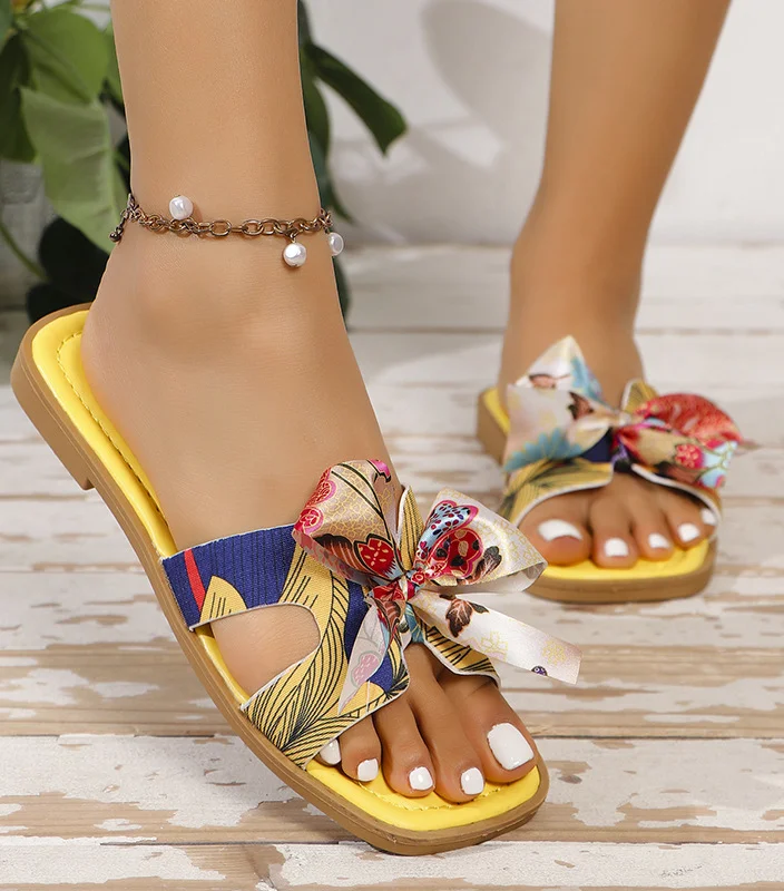Sweet summer style! Ribbon Square Toe Low Heel Summer Sandals feature a trendy square toe, comfortable low heel, and delicate ribbon detailing. Perfect for adding a touch of femininity to your warm-weather wardrobe.