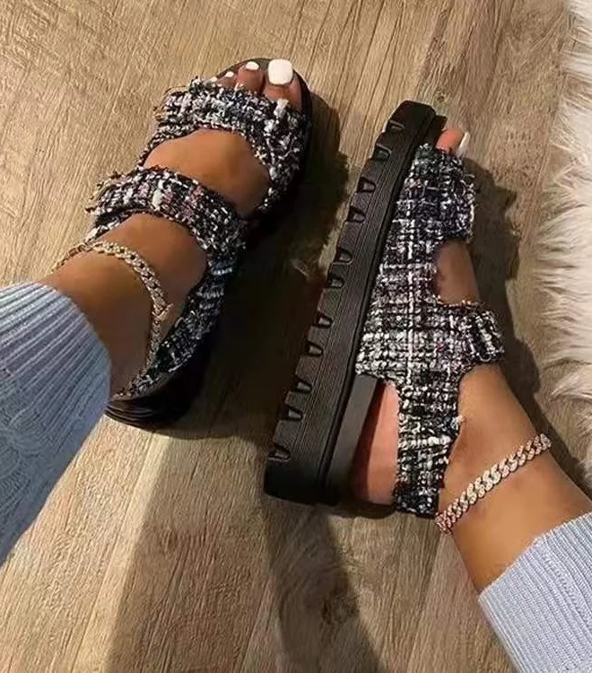 Comfortable Summer Steps: Plus Size Classic Velcro Beach Sandals. Adjustable velcro straps and a comfortable footbed provide a perfect fit for all-day beach fun.