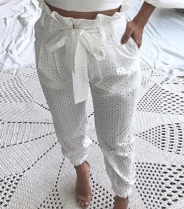 Comfortable & Chic - Made for easy wear, these lace print pants offer both style and comfort.