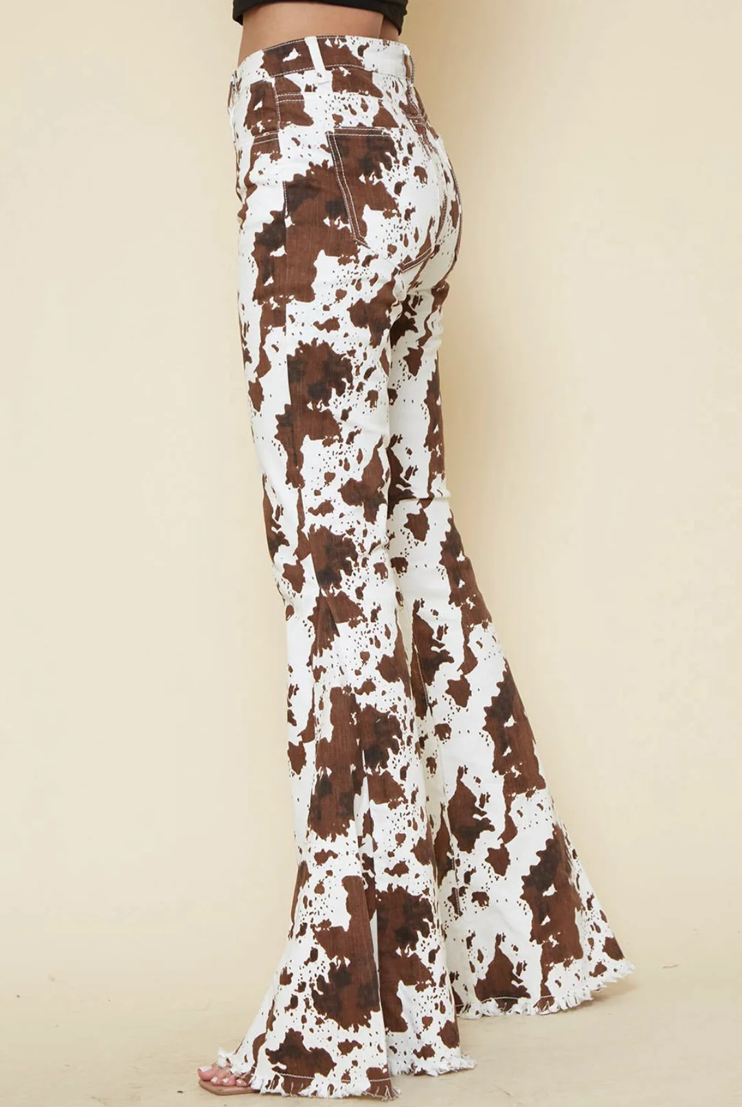 Close-up of mottled fall brown bell-bottom denim pattern