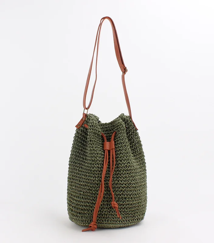 Women's Straw Bucket Bag - A stylish and natural bag made of straw, perfect for carrying items on the go, with a bucket shape and handle for easy carrying