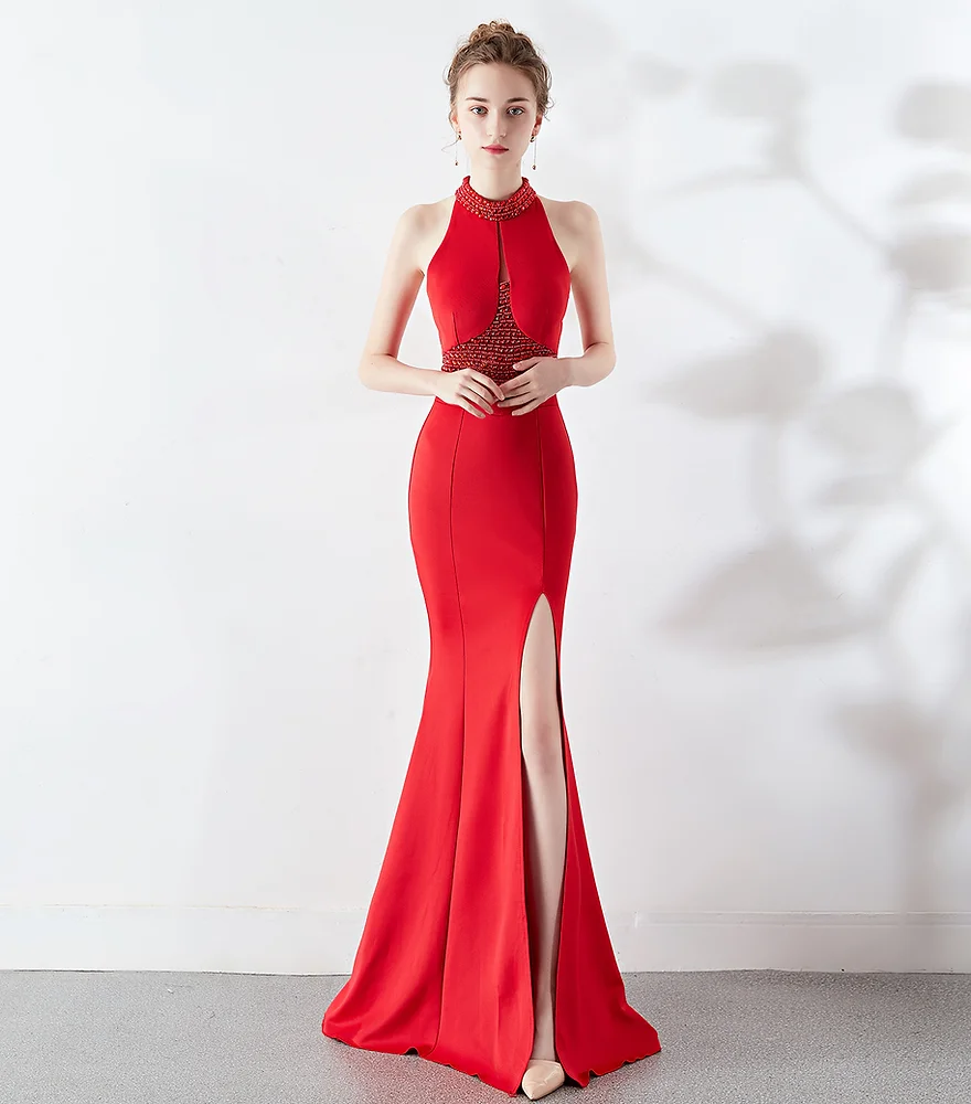 Long sequin halter maxi dress, ideal for a stunning and elegant prom look.