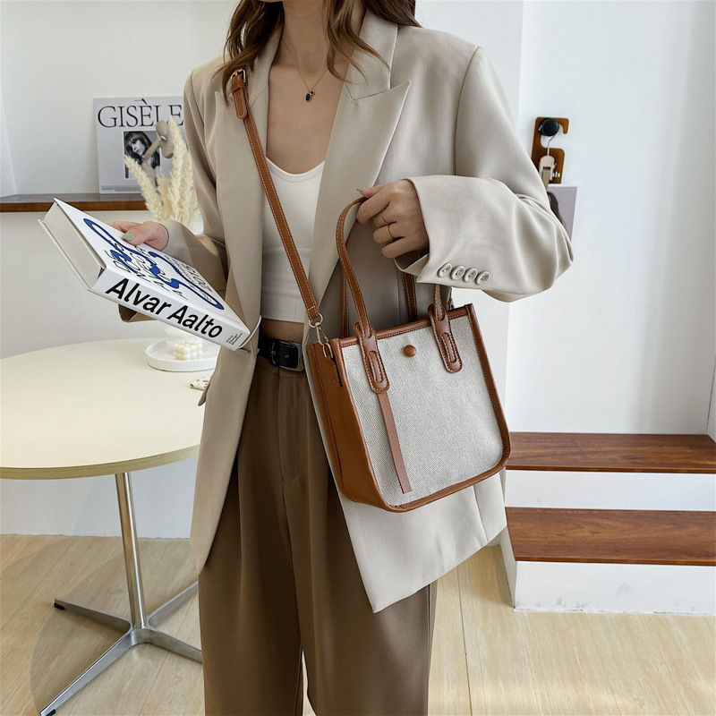 Thumbnail: RetroTote – Contrast-Stitch Crossbody Bag