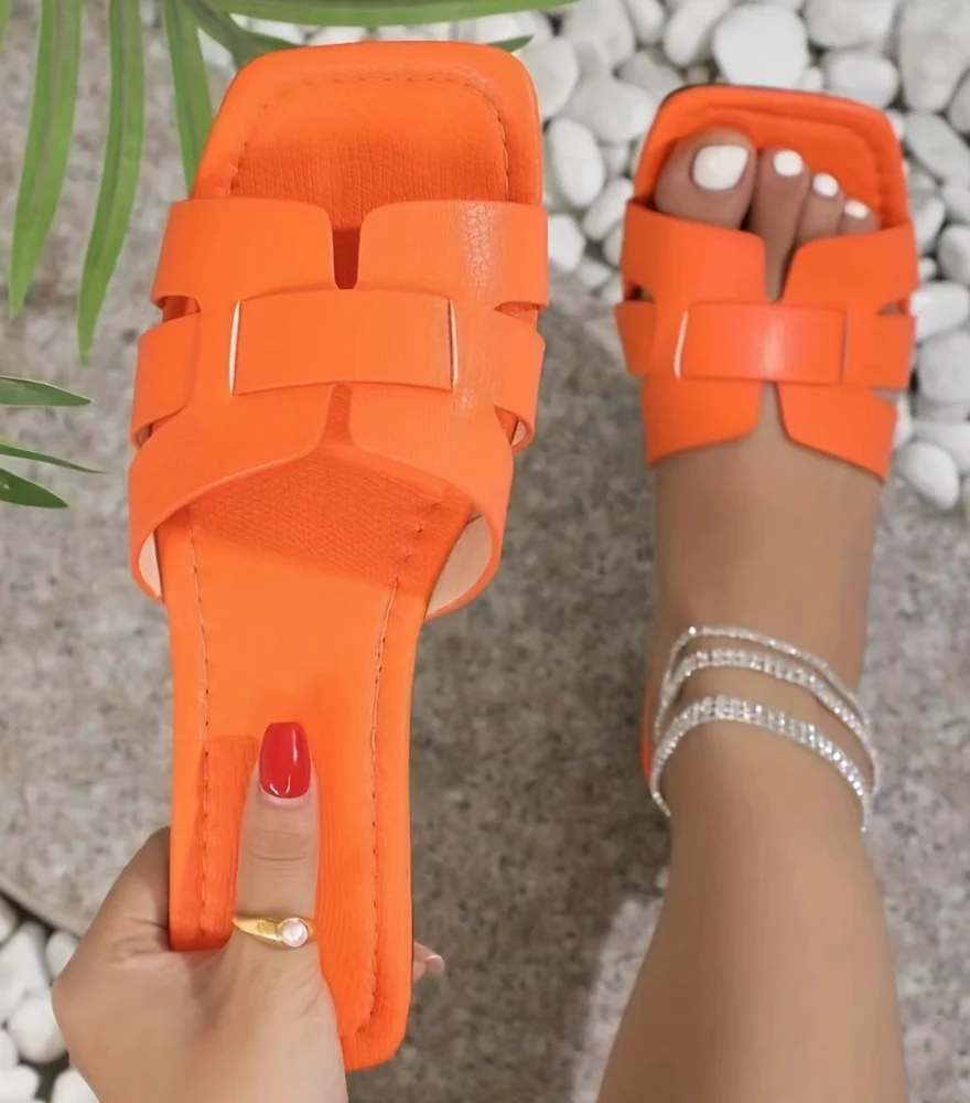 On-trend toes! Square Toe Flat Summer Sandals offer a modern silhouette with a comfortable flat sole. Perfect for summer adventures in style.