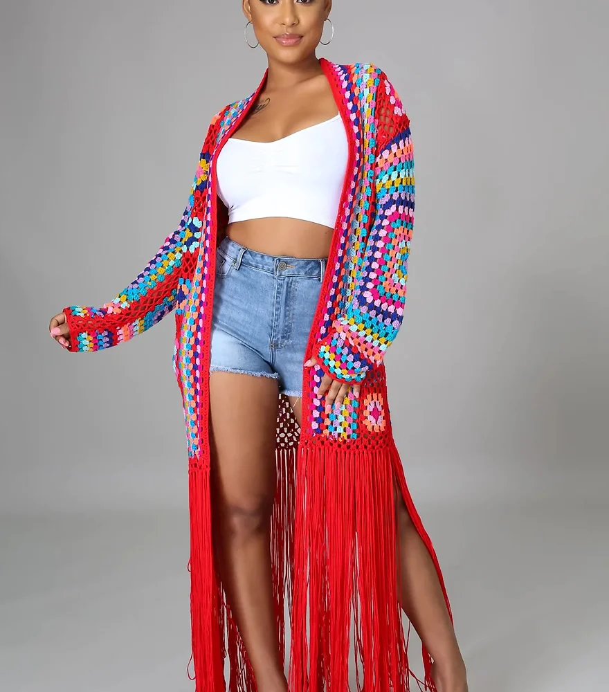 Embrace bohemian vibes with this handmade crochet cardigan, adorned with intricate floral patterns. Elevate your look with a touch of artisanal elegance.