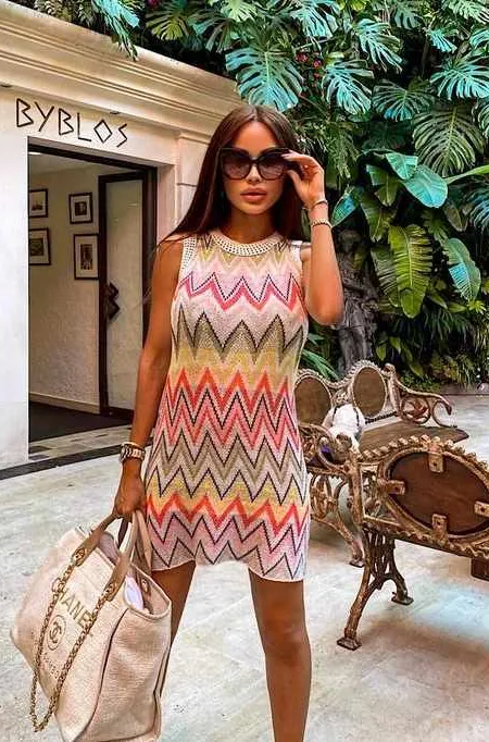 A stylish patchwork sleeveless knit mini dress, perfect for a fashionable look