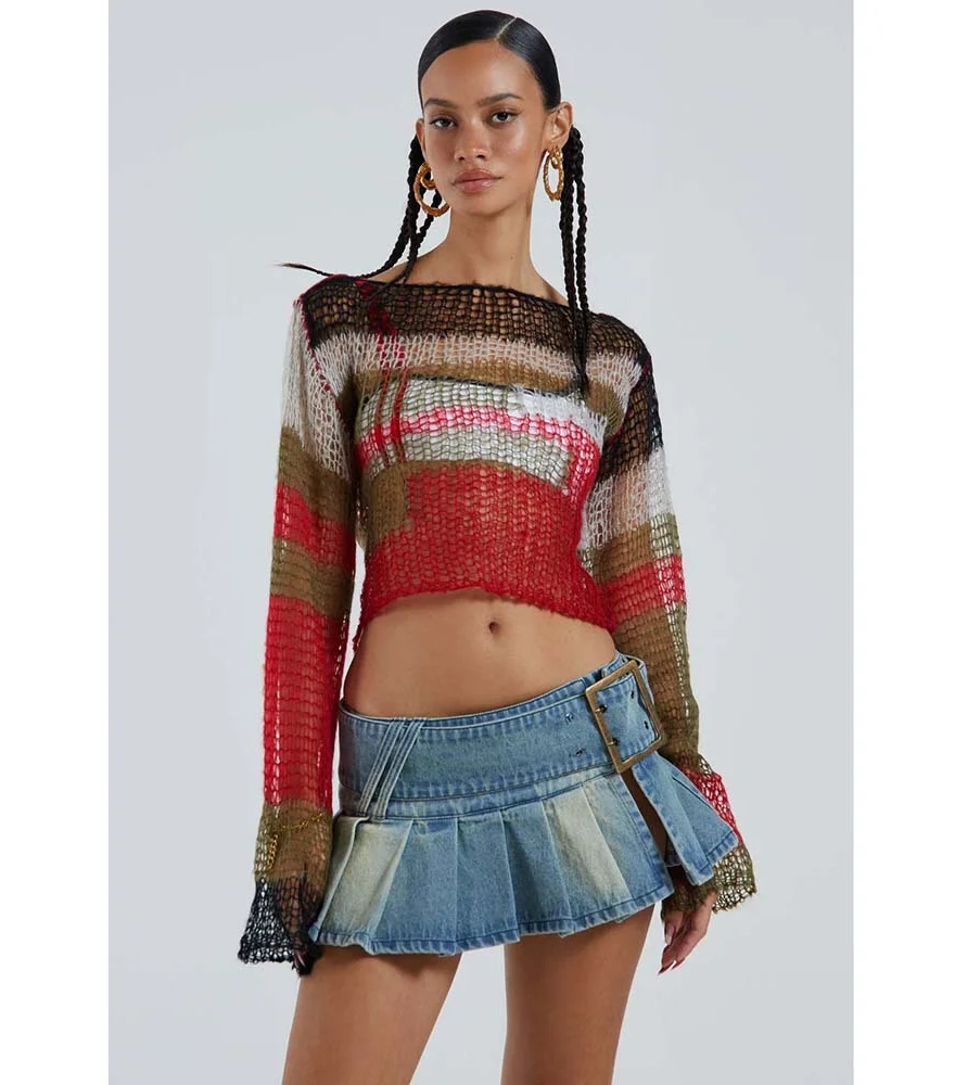 High-Fashion Mini: Ultra Short Denim Skirt offers a chic and trendy take on the classic mini skirt. Made from denim for a touch of timeless style, this skirt is perfect for showing off your legs and creating a variety of summer looks.