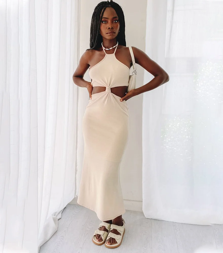 Vibrant and flowing, the Summer Serenity Halter Neck Strapless Dress is the perfect choice for effortless summer style