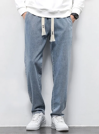 Elevate your casual wardrobe with these Summer Comfort Men's High-Waisted Straight Leg Jeans. Crafted for both style and comfort, these jeans feature a straight-leg design that offers a relaxed yet fashionable look. 
