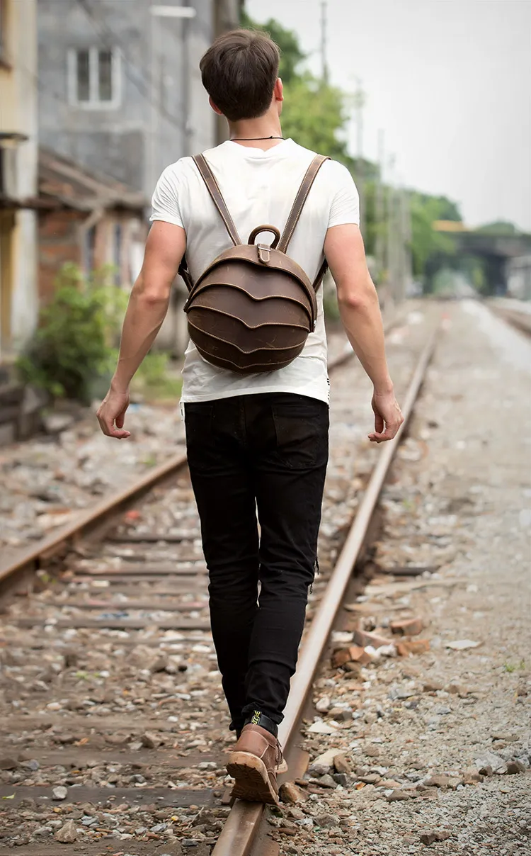 City Chic: Urban Explorer Leather Backpack - Navigate the urban landscape in style with this trendy and practical leather backpack. 🏙️🎒