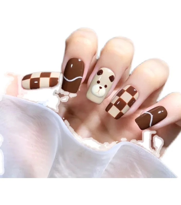 Adorn your nails with adorable hand-painted teddy bear designs, adding a playful and charming touch to your style.