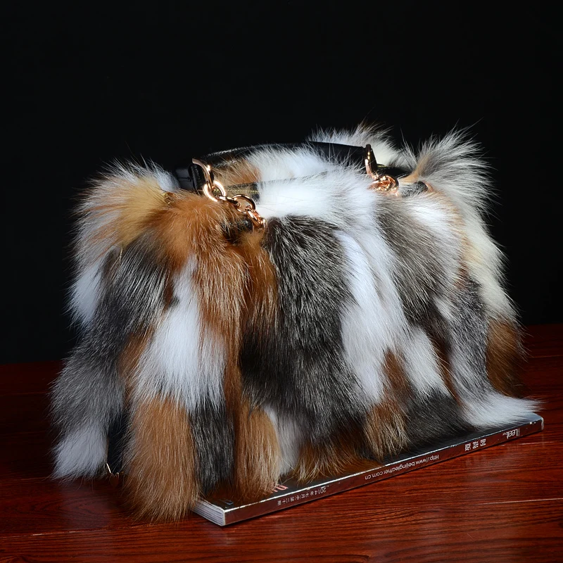Indulge in luxury with the Opulent Fox Fur Handbag. A statement piece that exudes sophistication, elevating your ensemble with timeless allure and unrivaled elegance