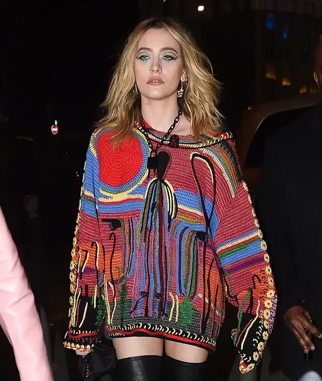Paris Jackson wearing knit cardigans