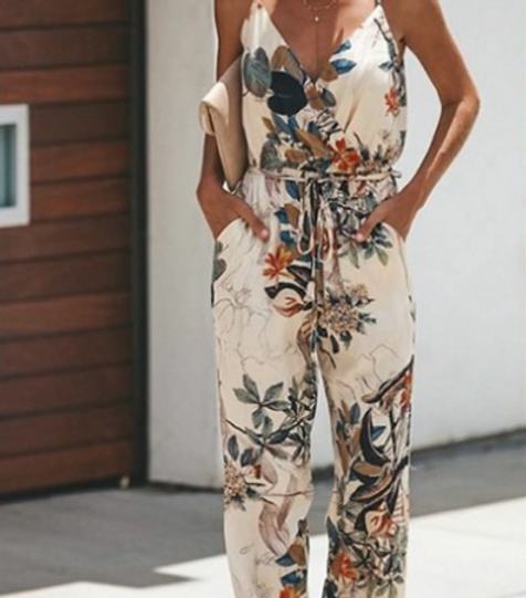 Summer jumpsuit with sunflowers - Dressy or casual, this spaghetti strap jumpsuit with a sunflower print is perfect for any occasion.