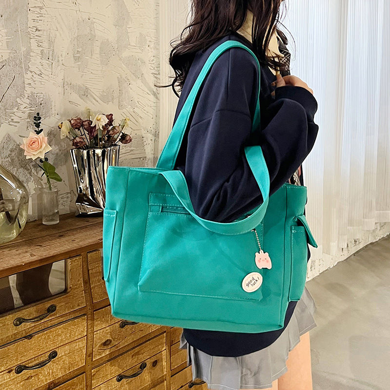 Thumbnail: Crossbody Multi-pocket Canvas Handbag