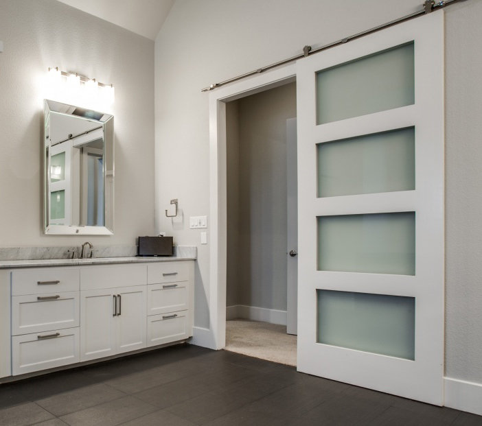 Custom sliding iron and glass interior door