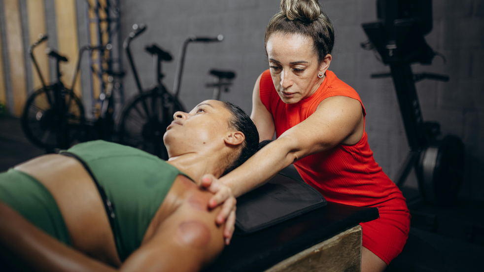 woman giving a sports massage