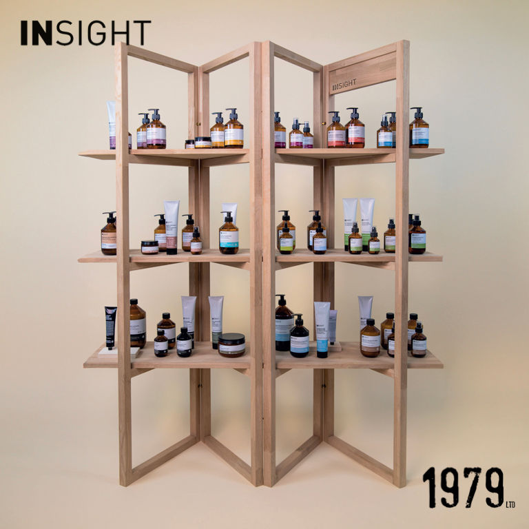 Eye-level view of a salon shelf stocked with various hair care products