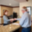 customer checking into quality inn and suites mcalester.jpg