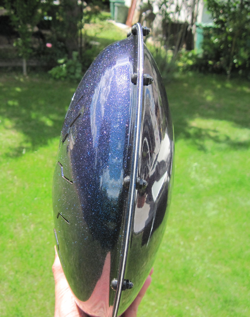 Thumbnail: side view stardust single mod vibedrum, steel tongue drum, handpan, b