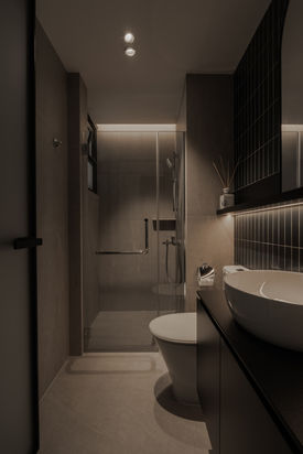 Spa-inspired luxury bathroom featuring a floating stone vanity and bold architectural fixtures in the Vela project.