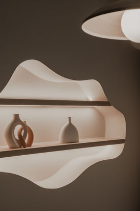 How the 'Wavelength' design transforms at night through strategic, bold ambient lighting placement.