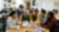 students looking through their yearbook.png