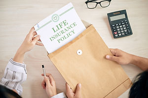 crop-people-with-contract-of-life-insurance-2021-08-27-09-38-25-utc.jpg