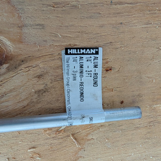 Hillman 1/4 inch by 3 foot aluminum round rod with product label