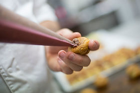filling-cream-puffs-with-chocolate-cream-2026-01-07-00-38-49-utc.jpg