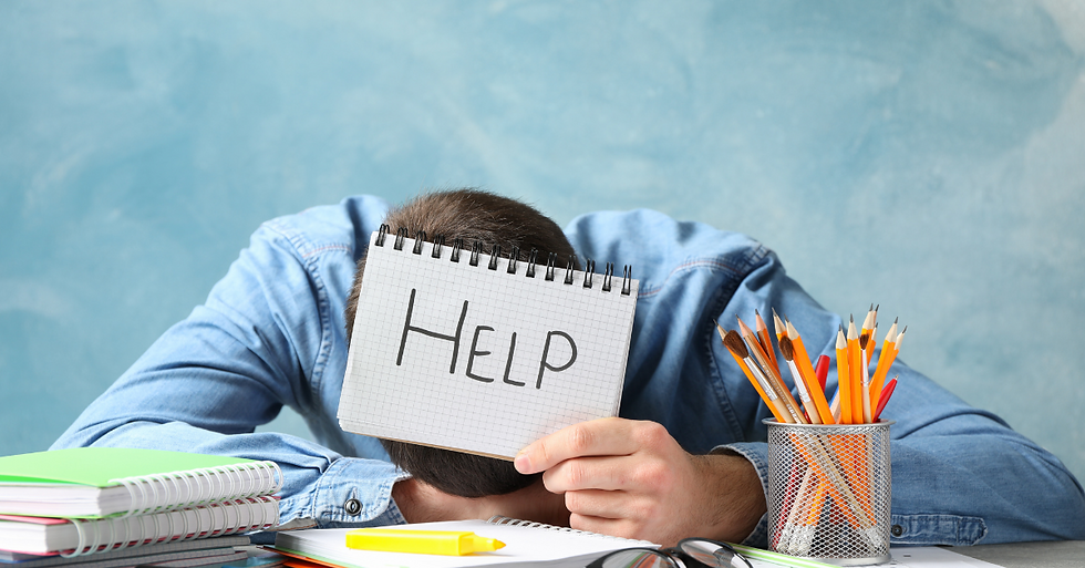 Stressed student or professional with head down on desk holding a notebook that reads "HELP", surrounded by books and pencils symbolizing burnout and the need for resilience under pressure.