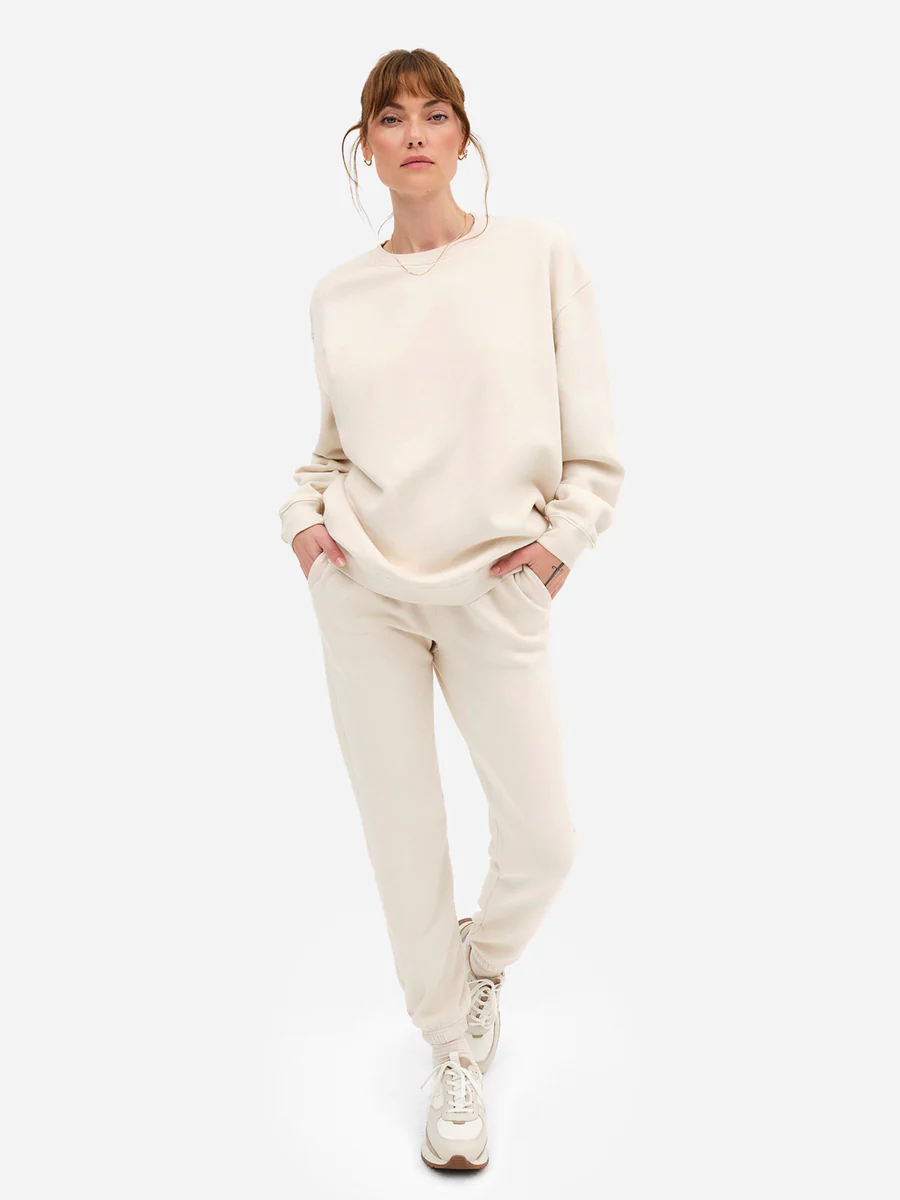 A woman wearing an organic cotton sweatshirt