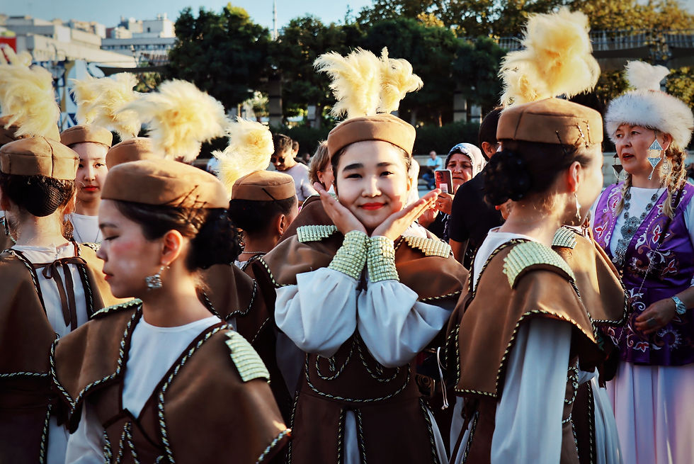 Cultural dance group in traditional costumes at an outdoor festival in İzmir, Türkiye.