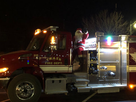 Holiday Happenings-FiretruckSanta.jpeg