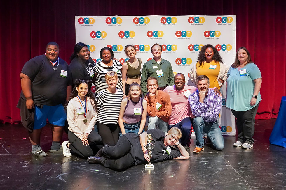 Laying in front: Tina Turley; Kneeling row from left: Mileidy Crespo-Jones, Jeanette Waterman, Hallie Grace Hamner, Gabriel Carden, DeAnthony Mays, and Steven Yates; Standing Row from left: Kazarious Brown, Amaria Jackson, Brandy Johnson, Margaret Carr, Adam Miller, Jessica Briana Kelly, and Lisa Ponder. The cast and crew of Theatre Tuscaloosa's production of "Launch Day (Love Stories from the Year 2108)" pose with their Best of Show trophy at the Alabama Community Theatre Festival on November 6, 2022, in the Bean-Brown Theatre. Photo by Porfirio Solórzano.
