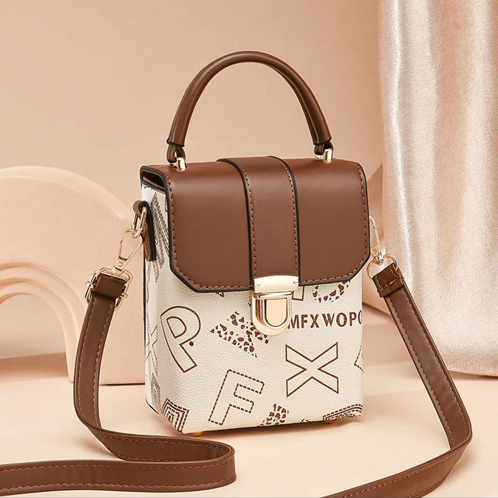 Thumbnail: Pretty Purse Daianealia Vegan leather mini-purse with detachable keychain.