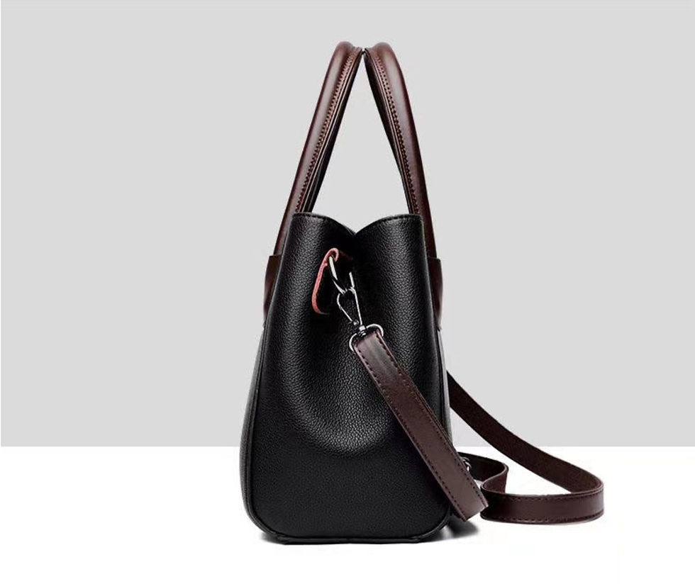 Thumbnail: Zaira curved vegan leather satchel with antique bronze hardware, side view
