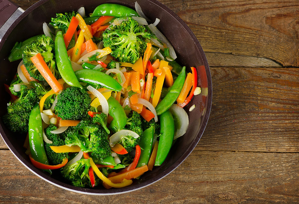 veggie stir fry with broccoli, peppers, carrots, sugar snap peas and onions
