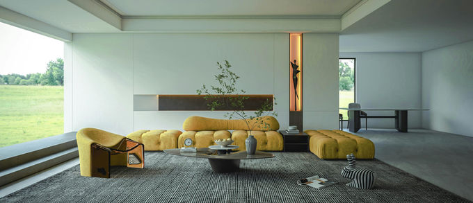 Salon moderne italien 2026 avec bloc d’armoires blanc et niche grise, canapé avec méridienne et fauteuils jaune curcuma, tapis graphique noir et blanc, table basse laquée grise, table à manger noire avec plateau en verre blanc et chaises assorties, ambiance contemporaine et élégante.