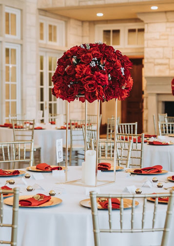 red roses and baby's breath flower ball centerpieces