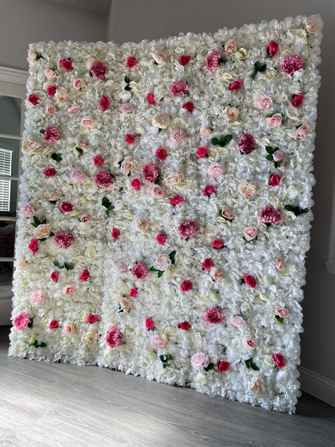 ivory , light pink, and hot pink flower wall 