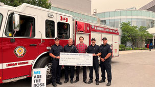 Firefighters step up with Boot Drive donation for RMH
