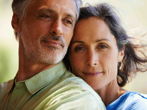 Middle aged couple looking calm