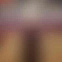 a person speaking in front of a table set for communion