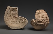 Late 11th to early 12th Centuries. Excavated at the east kilns in Nishapur, Iran. Earthenware; carved. Inscription in naskhi script; untranslated.48.101.5a and b: H. 6 3/8 in. (16.2 cm) W. 6 5/16 in. (16 cm)  D. 3 5/16 in. (8.4 cm) Wt. 23.9 oz. (677.7 g) 48.101.5c: H. 5 7/16 in. (13.8 cm) W. 5 5/16 in. (13.5 cm) D. 2 3/4 in. (7 cm) Wt. 12.2 oz. (345.9 g). Accession no. 48.101.5a–c.