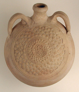 12th-13th Century. Excavated in Nishapur, Iran. Earthenware; molded decoration, unglazed. H. 7 1/16 in (18 cm) W. 8 1/4 in (21 cm). Accession no. 38.40.146.