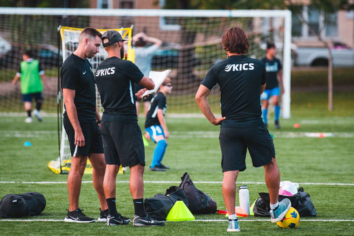 soccer players talking