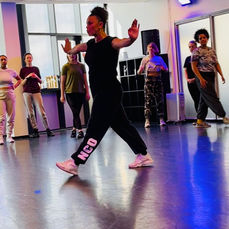 Adults wacking dance class.