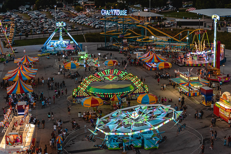 Thrill rides at the Iowa State Fair including Crazy Mouse and Centifuge